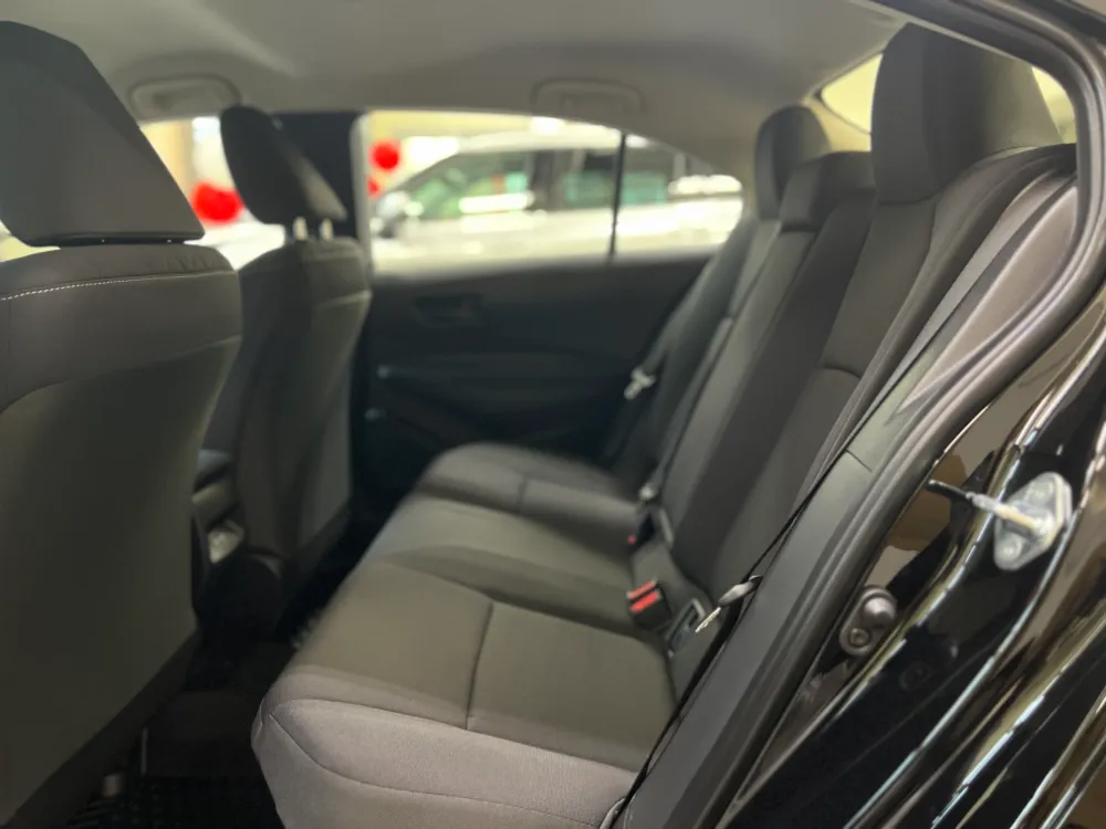 2023 toyota corolla hybrid le in black 18